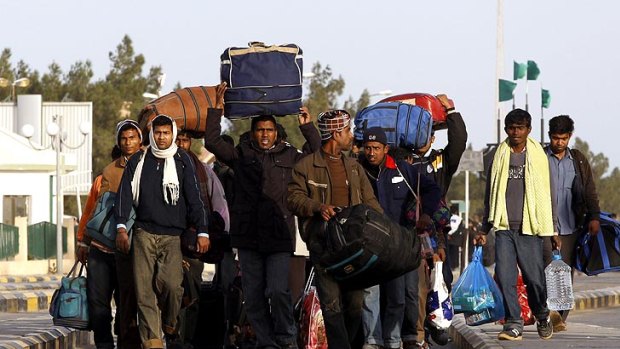 Foreign workers fleeing the fighting in Libya.