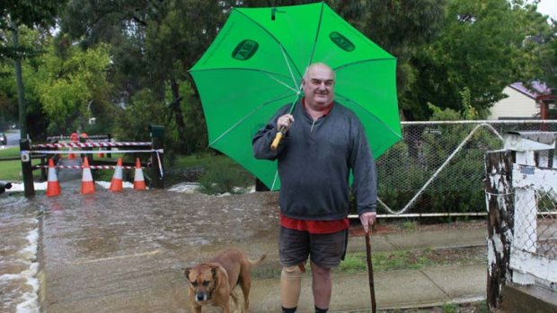 Rising waters &#8230; South Cooma resident Dave Smith.