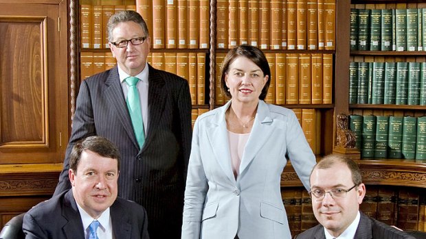 Ken Smith (second from left) with Paul Lucas, Anna Bligh and Andrew Fraser in 2010.