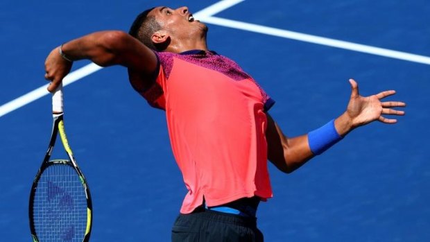 Nick Kyrgios of Australia serves against Mikhail Youzhny of Russia during his men's singles first round match on Day One of the 2014 US Open at the USTA Billie Jean King National Tennis Center