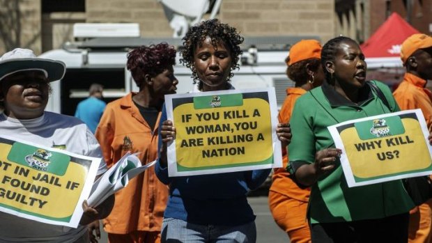 Controversial ruling ... African National Congress Women League members demonstrate outside the High Court in Pretoria.