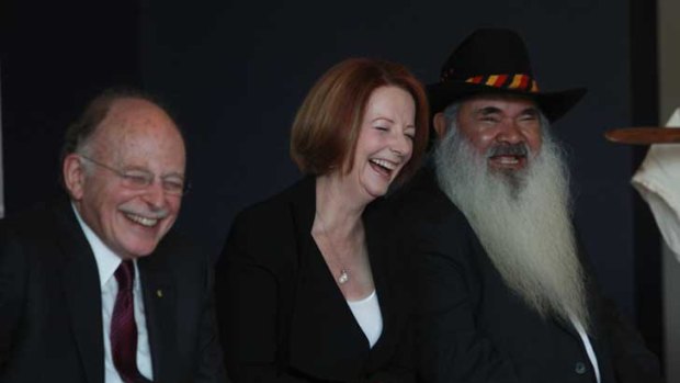 So far, so good: A delighted Julia Gillard with panel co-chairmen Mark Leibler (left) and Patrick Dodson in Canberra yesterday.