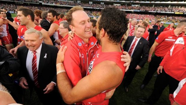 Brothers in arms: John Longmire and Adam Goodes.