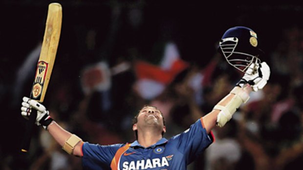 Another record bites the dust  ... Indian legend Sachin Tendulkar looks to the heavens after reaching his world-record one-day double century against South Africa in Gwalior on Wednesday.