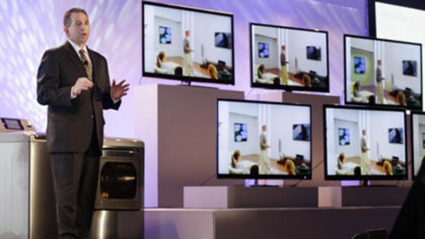 Tim Alessi, LG's director of new product development for home electronics, talks about 3D HDTV technology during a press preview at the Consumer Electronics Show.