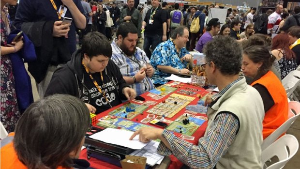 Rather than just wander past exhibits, PAX attendees are happy to sit down and invest their time in strategy games like A Feast for Odin.