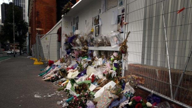 The shrine commemorating three pedestrians killed in a wall collapse.