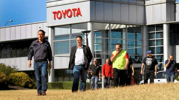 AMWU officials Steve Dargavel and Dave Smith leave talks to speak to the media after Toyota announced the closure of the Altona factory by 2017.