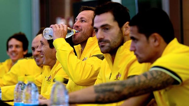 Lucas Neill (centre) says the Socceroos are 'calm'.