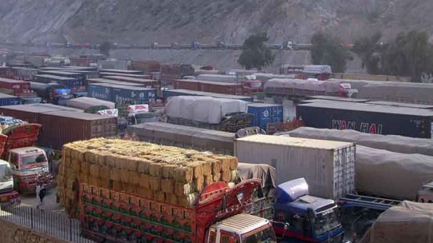 Cargo trucks, including those carrying supplies to NATO forces, are halted at the Pakistan-Torkham border as Pakistanis protest against the air strikes that killed 25 soldiers.