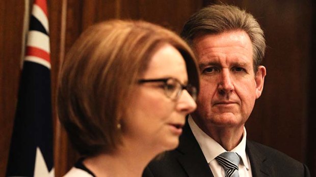 No better, no worst: NSW premier Barry O'Farrell, right, with Prime Minister Julia Gillard.
