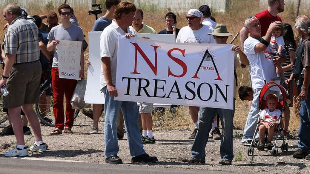 Protesters chant and sing songs at the entrance of the National Security Agency Utah Data Center being built in Bluffdale, Utah.