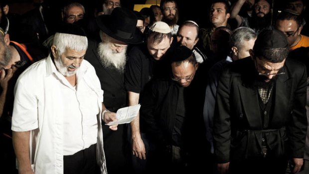 The funeral for Aharon Smaja, 49, one of the three people who died in a rocket attack.