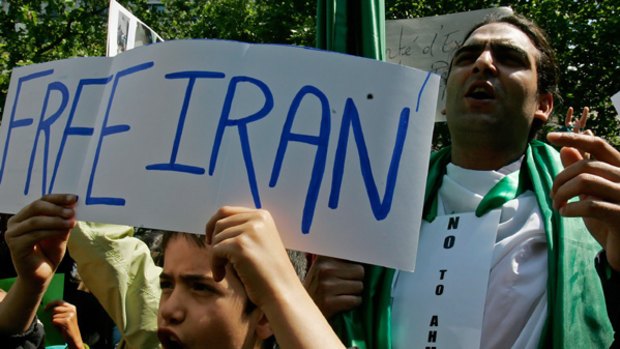 Iranians demonstrate to protest the outcome of the presidential election.
