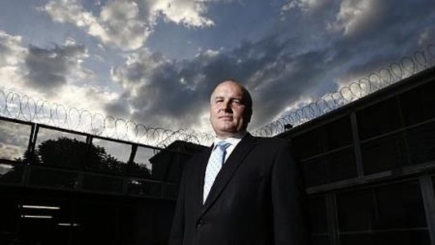 Corrections Minister David Elliott has announced a review into the lengthy isolation of children in custody.