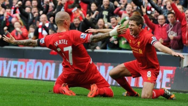 Jubilation: Liverpool captain Steven Gerrard celebrates teammate Martin Skrtel's goal against Manchester City.