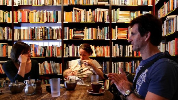 A few of the new options for booksellers on the table ... Leonie Robertson, left, Charmaine Keegan, baby Ernest, and Dennis Robertson at Gertrude &amp; Alice Cafe Bookstore in Bondi.