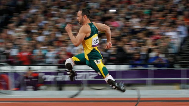 Silver medal ... Oscar Pistorius competes in the men's 200m final.