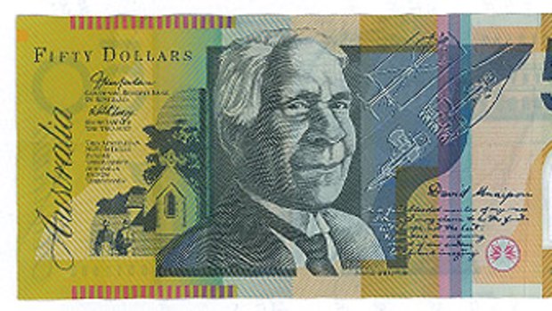 Spot the difference ... a genuine $50 note.
