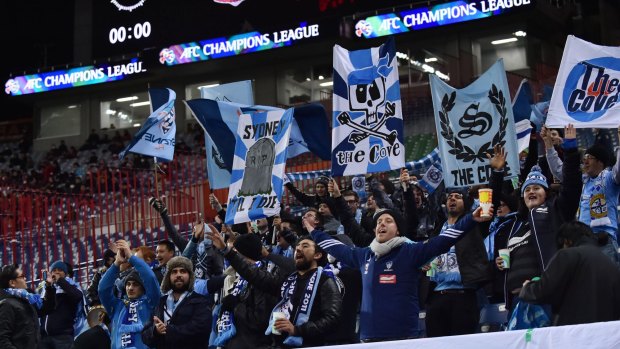 Long night: The travelling Sydney FC fans had little to cheer about in Saitama.