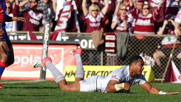 At his best ... Tony Williams scores for Manly during Sunday's win over Newcastle.