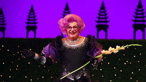 Frock 'n' roll: Dame Edna is ''blissfully retired'', but only from touring, says her manager Barry Humphries.