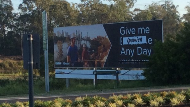 In protest at a Brisbane Marketing billboard being placed on their turf, Ipswich residents took matters into their own hands.