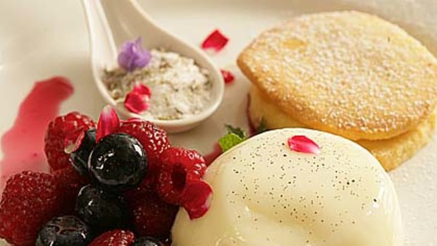 Mount Kembla Hotel's vanilla bean panna cotta with berries, orange blossom, sable biscuits and lavender sherbet.