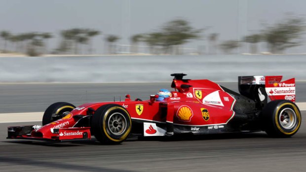 Revved up: Fernando Alonso in action in Bahrain.