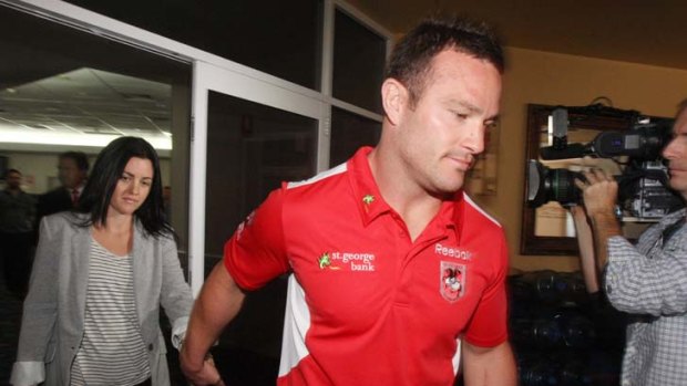 Out the door &#8230; Dean Young leaves the Steelers Club in Wollongong with his wife Brooke yesterday. The 28-year-old Dragons star will retire from the game at the end of the season due to a long-standing  knee injury.