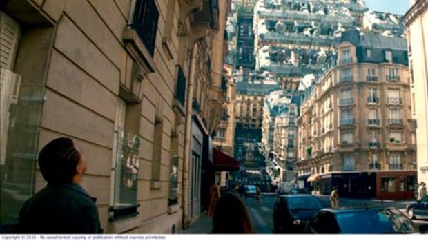 Tell 'em they're dreaming ... Leonardo DiCaprio navigates Christopher Nolan's inverted reality in which the streets of Paris buckle and morph until they form a confusing canopy.