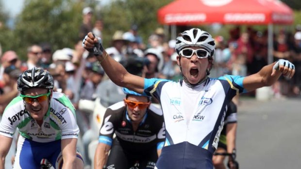 Young gun &#8230; Caleb Ewan celebrates his win as he crosses the line in Geelong yesterday. The 17-year-old's performances have already attracted the attention of first division teams.