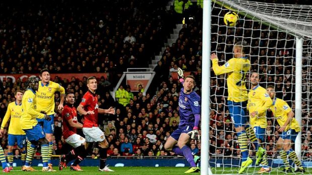 Oh not not you again: Manchester United's Robin van Persie watches his header sail in against old club Arsenal at Old Trafford.