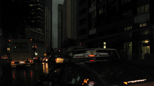 Darkness enveloped Brisbane's CBD as storms hit the city, as shown in this photograph taken at 4.15pm.