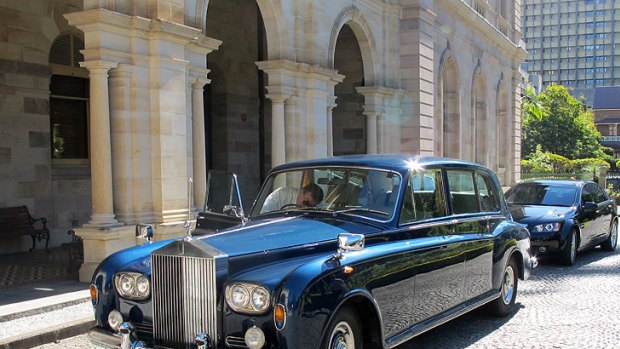 The Rolls Royce is prepared for Governor Penelope Wensley's arrival at Parliament House.