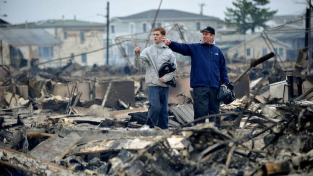 In the Breezy Point section of Queens, fire followed wind and rain.