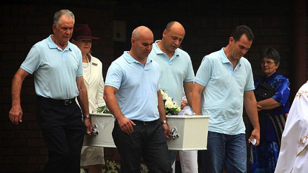 Kevin's family carry his coffin out of Our Lady of Fatima Catholic Church, Kingsgrove.