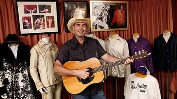 Former Yellow Wiggle Greg Page with his Elvis memorabilia collection that is on loan to the Elvis Festival in Parkes.