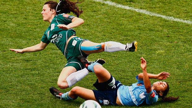 Crunch clash &#8230; Hayley Raso is tackled by Teresa Polias in Sydney FC's match on Saturday.