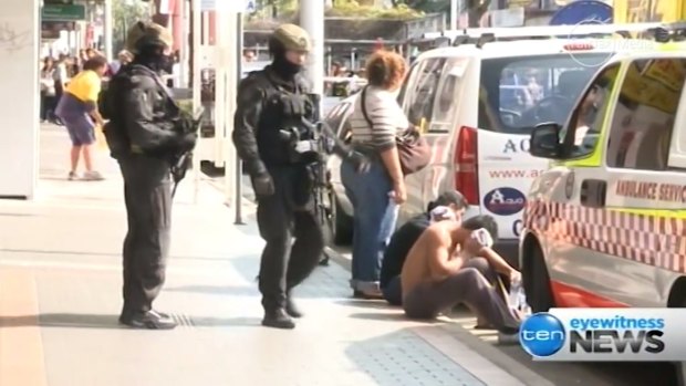The scene in Cabramatta on Monday. Three men, including a suspended police officer, have been charged with robbery in company.