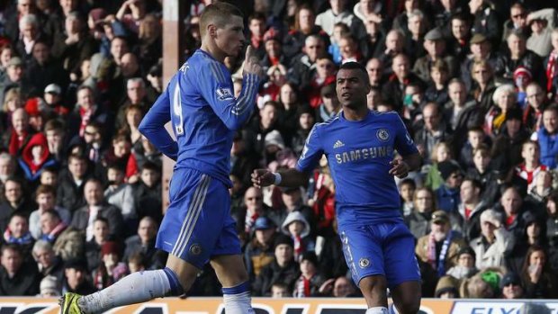 Lucky escape ... Chelsea's Fernando Torres  celebrates his goal against Brentford.