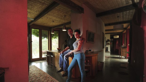  John Schneider and Jill Dobkin inside their rural property. 1