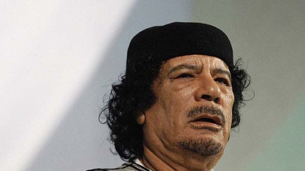 Libyan leader Muammar Gaddafi gives a speech in Rome last year.