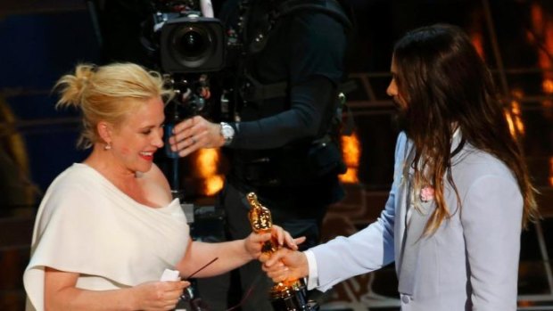 Patricia Arquette accepts the Oscar for Best Supporting Actress for her role as a single mum in Boyhood at the 87th Academy Awards in Hollywood.