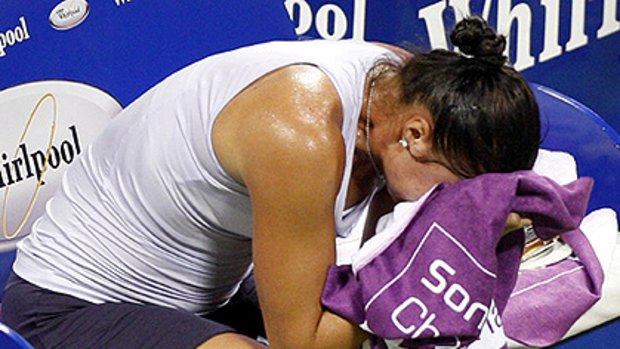 A tearful Dinara Safina retires hurt in Doha, throwing her Australian summer into doubt.