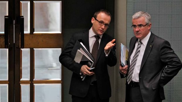 Opposing offshore processing ... Greens MP Adam Bandt, left, and Independent MP Andrew Wilkie.