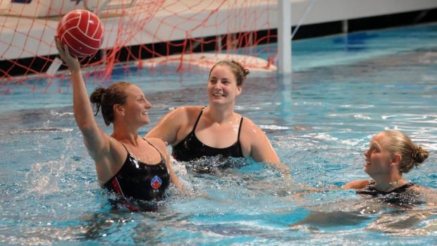 Australian olympic waterpolo  squad  players  Melissa Rippon, left, Ash Suthern and Kate Gynther at the  are in training at the AIS .