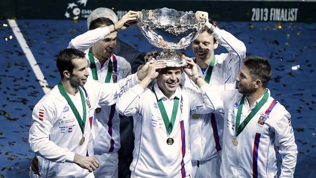 Czech Republic's team members Radek Stepanek, Lukas Rosol, captain Vladimir Safarik, Tomas Berdych and Jan Hajek (L-R) pose with the Davis Cup.