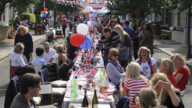 Long to rain over us ... Britons marked the jubilee festival with street parties and enthusiasm that could not be dampened.