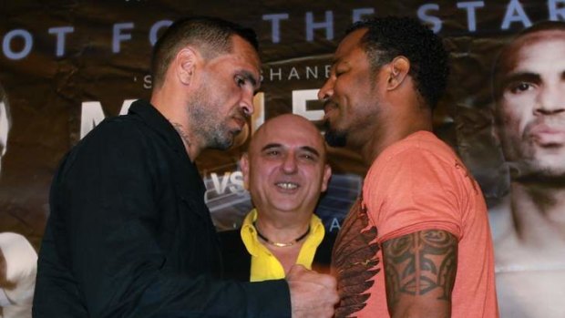 Talk is cheap: Anthony Mundine and Shane Mosley enter the ring Wednesday night.